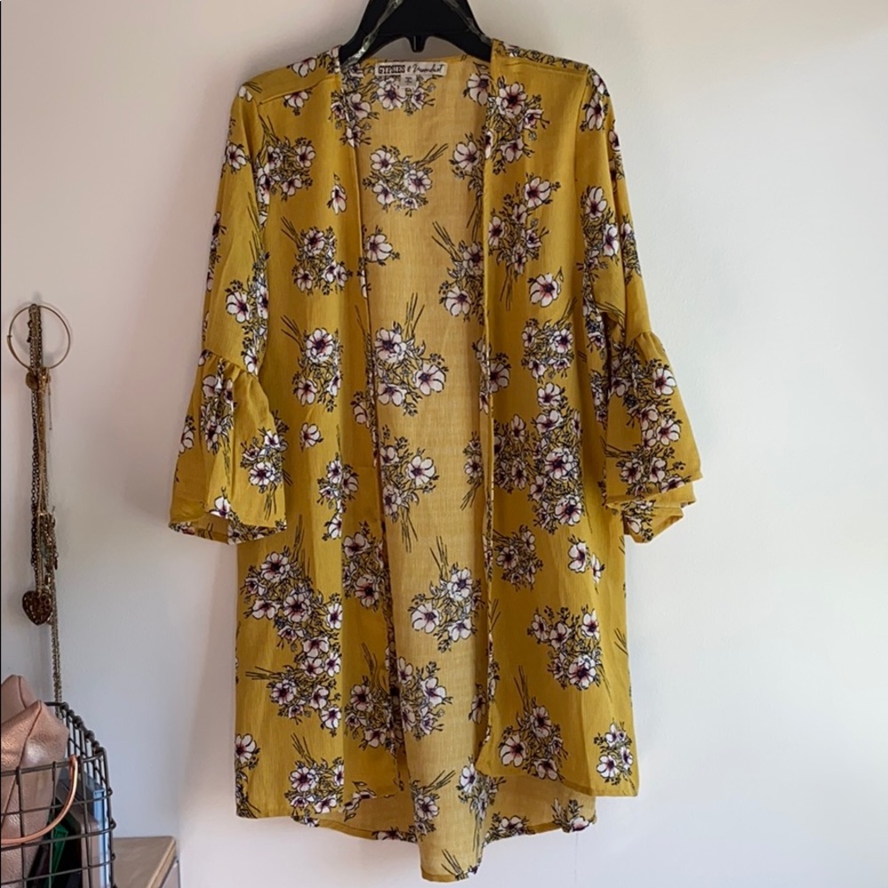 a light, yellow, airy, cardigan